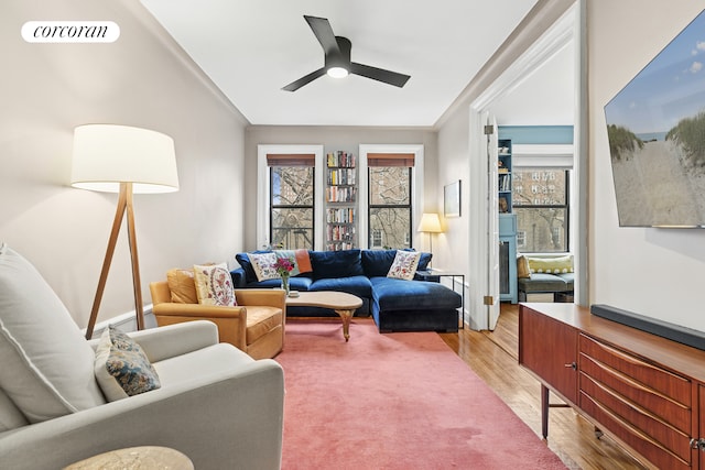 875 W 181st St Unit 6B, New York City, NY 10033 - living room featuring plenty of natural light, light wood finished floors, and ceiling fan
