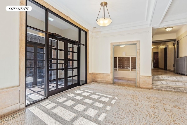 875 W 181st St Unit 6B, New York City, NY 10033 - spare room with wainscoting, french doors, and ornamental molding