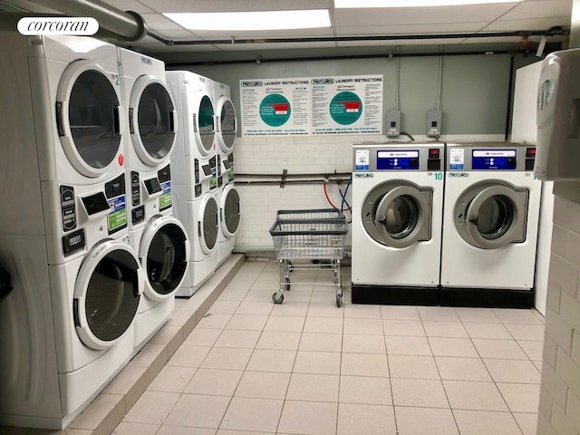 875 W 181st St Unit 6B, New York City, NY 10033 - communal laundry room with stacked washer / dryer and washer and dryer