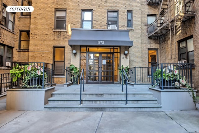 875 W 181st St Unit 6B, New York City, NY 10033 - entrance to property featuring brick siding and french doors