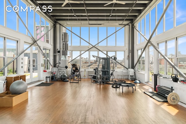 689 Myrtle Ave Unit 4E, New York City, NY 11205 - workout area featuring a view of city, wood finished floors, and a high ceiling