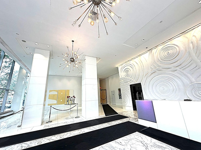 635 W 42nd St Unit 4K, New York City, NY 10036 - welcome area with a chandelier and recessed lighting