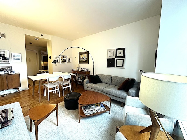 635 W 42nd St Unit 4K, New York City, NY 10036 - living room with wood finished floors