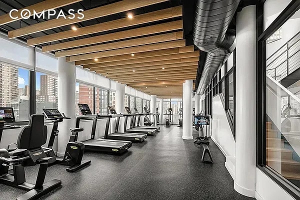 275 W 96th St Unit 12B, New York City, NY 10025 - exercise room with healthy amount of natural light and a view of city