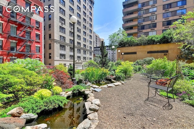 275 W 96th St Unit 12B, New York City, NY 10025 - view of community with a garden pond