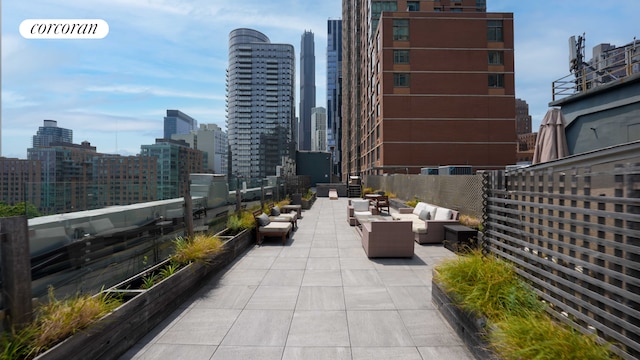 176 Johnson St Unit 2E, New York City, NY 11201 - view of patio / terrace with an outdoor hangout area and a view of skyline