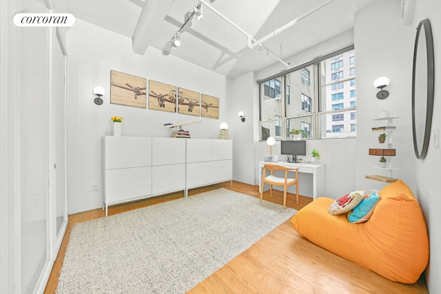 176 Johnson St Unit 2E, New York City, NY 11201 - sitting room with track lighting, wood finished floors, and a desk