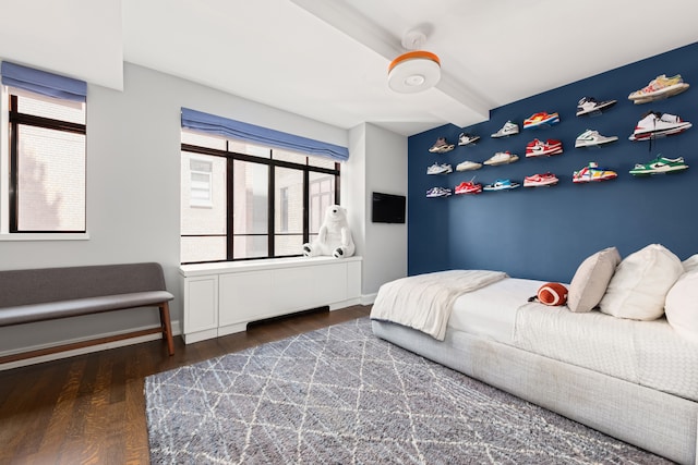 130 W 12th St Unit 9A, New York City, NY 10011 - bedroom with wood finished floors and beam ceiling