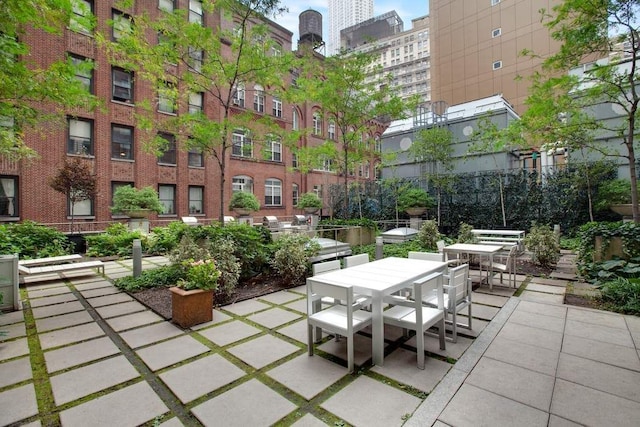 99 John St Unit 1011, New York City, NY 10038 - view of home's community featuring outdoor dining area and a patio