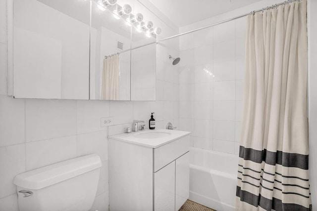 99 John St Unit 1011, New York City, NY 10038 - full bathroom with tile walls, toilet, vanity, shower / bath combo with shower curtain, and decorative backsplash