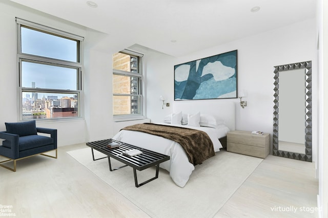 120 E 87th St Unit R14F, New York City, NY 10128 - bedroom featuring wood finished floors and recessed lighting