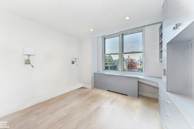 120 E 87th St Unit R14F, New York City, NY 10128 - spare room with light wood-style flooring and recessed lighting