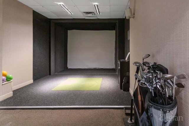 330 E 38th St Unit 8Ij, New York City, NY 10016 - playroom with golf simulator, a drop ceiling, carpet flooring, and baseboards