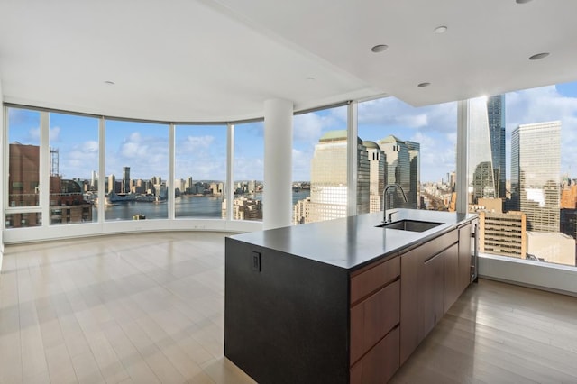 50 W St Unit 49-D, New York City, NY 10006 - kitchen with a sink, a skyline view, and modern cabinets