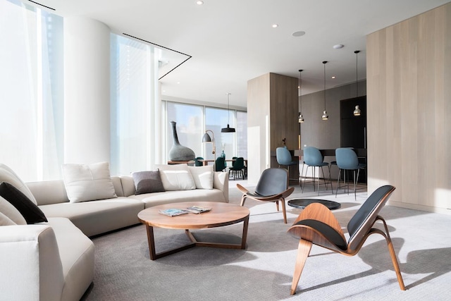 50 W St Unit 49-D, New York City, NY 10006 - living room featuring a wall of windows and light colored carpet