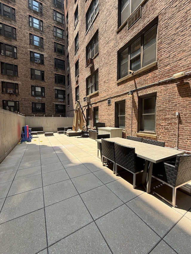 1049 Park Ave Unit 7A, New York City, NY 10028 - view of home's community featuring outdoor dining area and a patio area