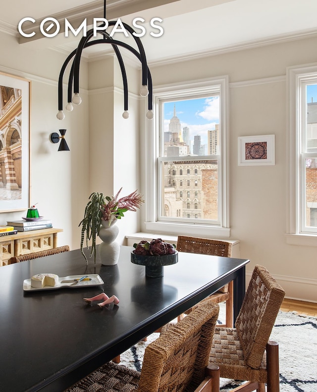170 2nd Ave Unit 6B, New York City, NY 10003 - dining space featuring plenty of natural light, crown molding, and wood finished floors