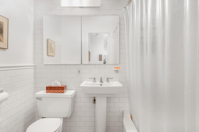 80 La Salle St Unit 18A, New York City, NY 10027 - bathroom with tile walls and shower / tub combo