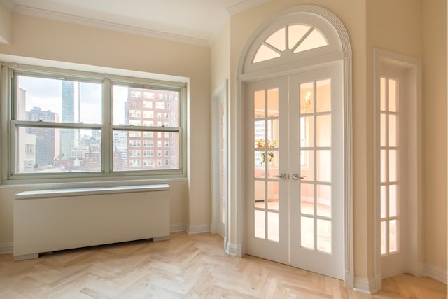 205 E 63rd St Unit 12C, New York City, NY 10065 - doorway with french doors and ornamental molding
