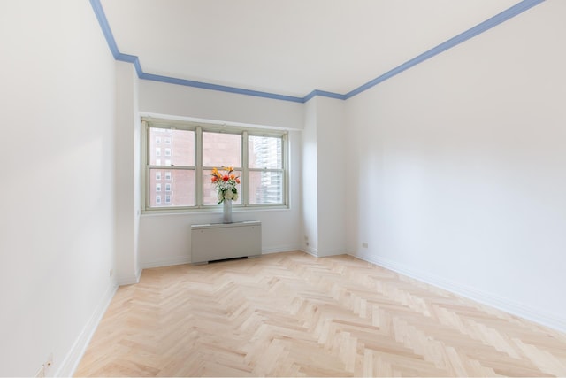 205 E 63rd St Unit 12C, New York City, NY 10065 - spare room with crown molding
