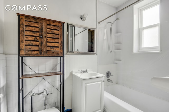 9801 Shore Rd Unit 4P, New York City, NY 11209 - full bath featuring tub / shower combination, tile walls, and vanity