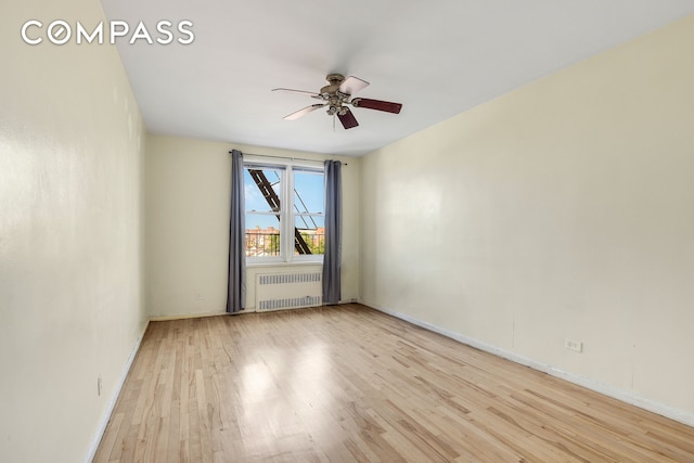 9801 Shore Rd Unit 4P, New York City, NY 11209 - empty room featuring radiator, ceiling fan, and wood finished floors