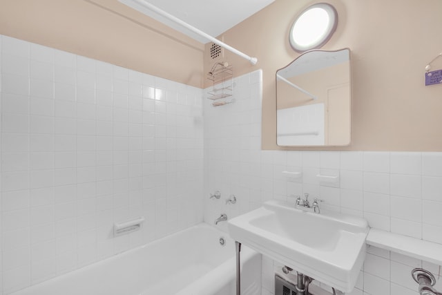 11 E 87th St Unit 9F, New York City, NY 10128 - full bath featuring shower / bathtub combination and tile walls