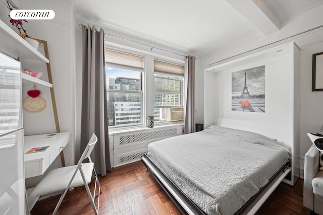 433 W 34th St Unit 15B, New York City, NY 10001 - bedroom featuring radiator heating unit