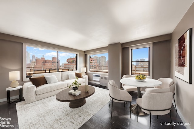 330 3rd Ave Unit 18B, New York City, NY 10010 - living area with a skyline view, healthy amount of natural light, and wood finished floors