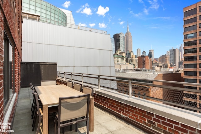 330 3rd Ave Unit 18B, New York City, NY 10010 - patio / terrace with a view of skyline and outdoor dining area