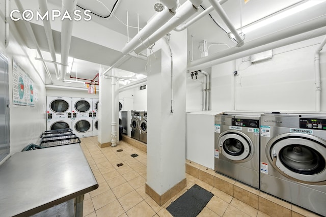 1360 Ocean Pkwy Unit 7B, New York City, NY 11230 - shared laundry room with washing machine and dryer, estacked washer and dryer, and tile patterned flooring