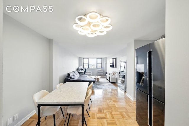 1360 Ocean Pkwy Unit 7B, New York City, NY 11230 - dining space with a chandelier and baseboards