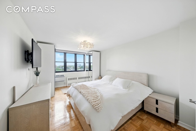 1360 Ocean Pkwy Unit 7B, New York City, NY 11230 - bedroom featuring radiator heating unit and baseboards