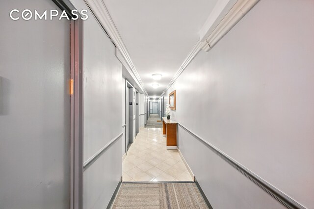 1360 Ocean Pkwy Unit 7B, New York City, NY 11230 - corridor featuring light tile patterned flooring