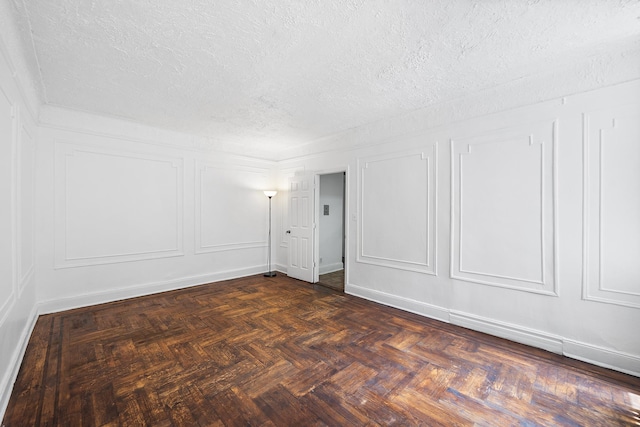41-25 44th St Unit C5, New York City, NY 11104 - empty room featuring a decorative wall and a textured ceiling