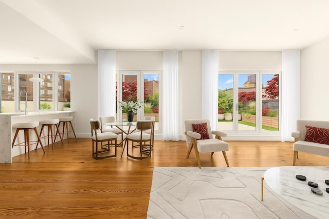 427 E 90th St Unit Penthouse9, New York City, NY 10128 - sitting room featuring wood finished floors and plenty of natural light