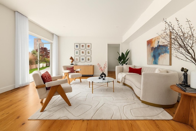 427 E 90th St Unit Penthouse9, New York City, NY 10128 - living area featuring wood finished floors and baseboards
