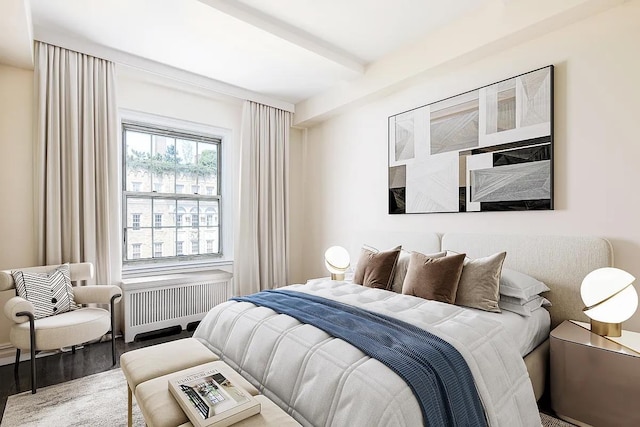 25 5th Ave Unit 14B, New York City, NY 10003 - bedroom with radiator heating unit and wood finished floors