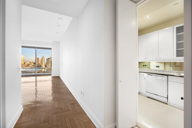 845 United Nations Plz Unit 11-C, New York City, NY 10017 - corridor featuring baseboards and recessed lighting