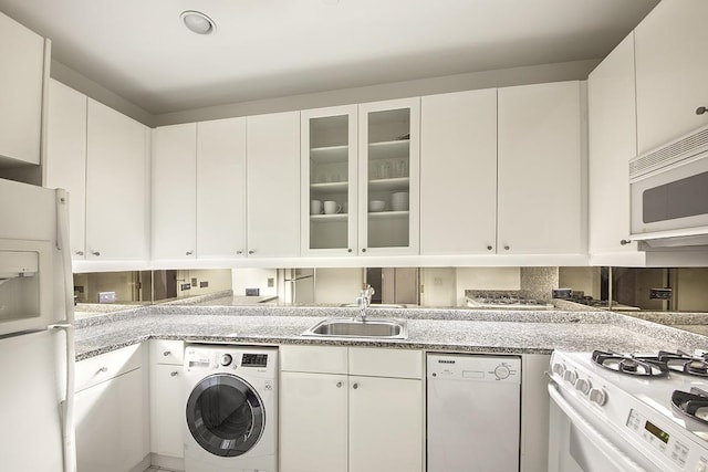 845 United Nations Plz Unit 11-C, New York City, NY 10017 - laundry room featuring washer / dryer