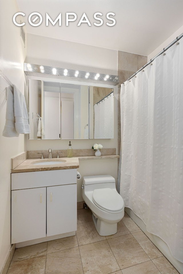 393 W 49th St Unit 5C, New York City, NY 10019 - bathroom featuring vanity and tile patterned flooring
