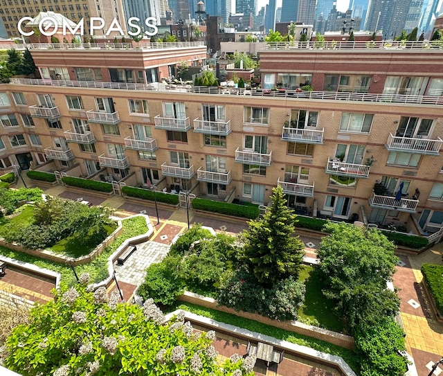 393 W 49th St Unit 5C, New York City, NY 10019 - view of community featuring a view of city