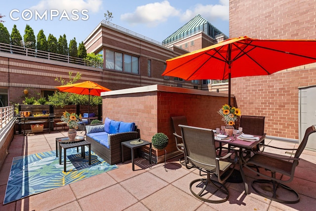 393 W 49th St Unit 5C, New York City, NY 10019 - view of patio featuring outdoor dining area and an outdoor living space
