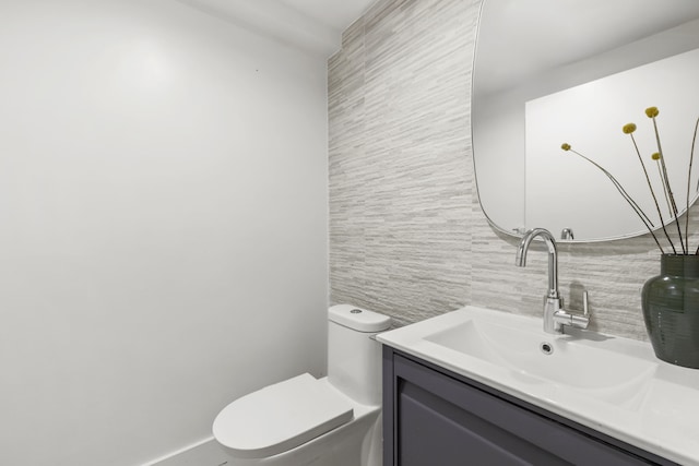 153 Green St Unit 1B, New York City, NY 11222 - bathroom with tile walls, vanity, and backsplash