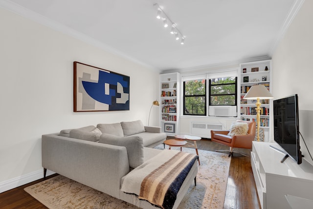 160 W 85th St Unit 5H, New York City, NY 10024 - living area with radiator heating unit, dark wood-style floors, crown molding, and track lighting
