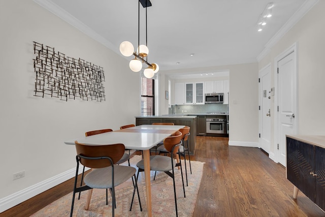 160 W 85th St Unit 5H, New York City, NY 10024 - dining space with crown molding, dark wood-style flooring, and a chandelier