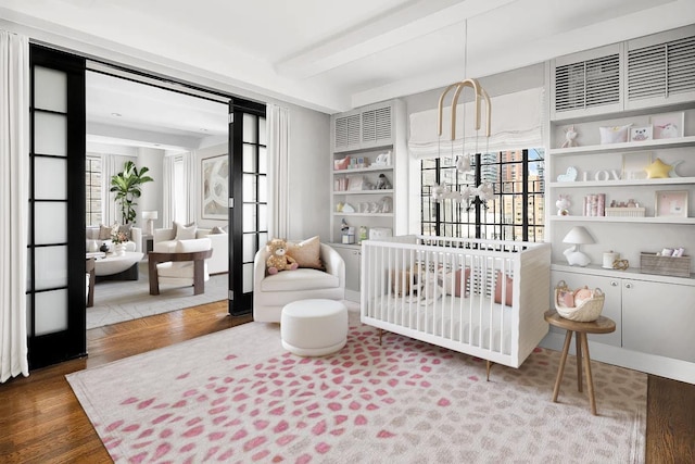 227 E 57th St Unit 12Eg, New York City, NY 10022 - bedroom with wood finished floors