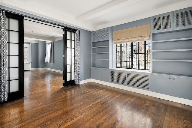 227 E 57th St Unit 12Eg, New York City, NY 10022 - empty room featuring wood finished floors and french doors