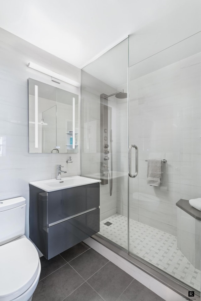 222 E 80th St Unit 6-C, New York City, NY 10075 - full bathroom with vanity, tile patterned floors, and a stall shower