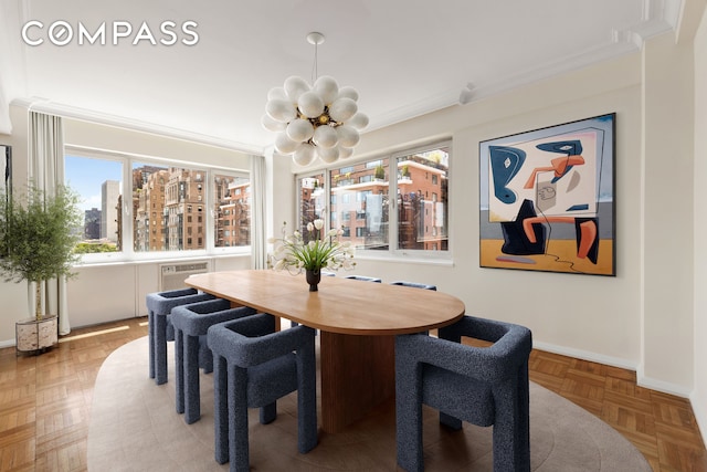 45 Sutton Pl S Unit 14N, New York City, NY 10022 - dining space with a chandelier, ornamental molding, and a city view